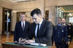 Djordjevic signs book of condolences at Russian Embassy